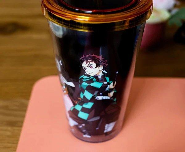 https://media.gamestop.com/i/gamestop/20003074_ALT04/Demon-Slayer-Acrylic-Carnival-16oz-Cup-with-Lid-and-Straw?$pdp$