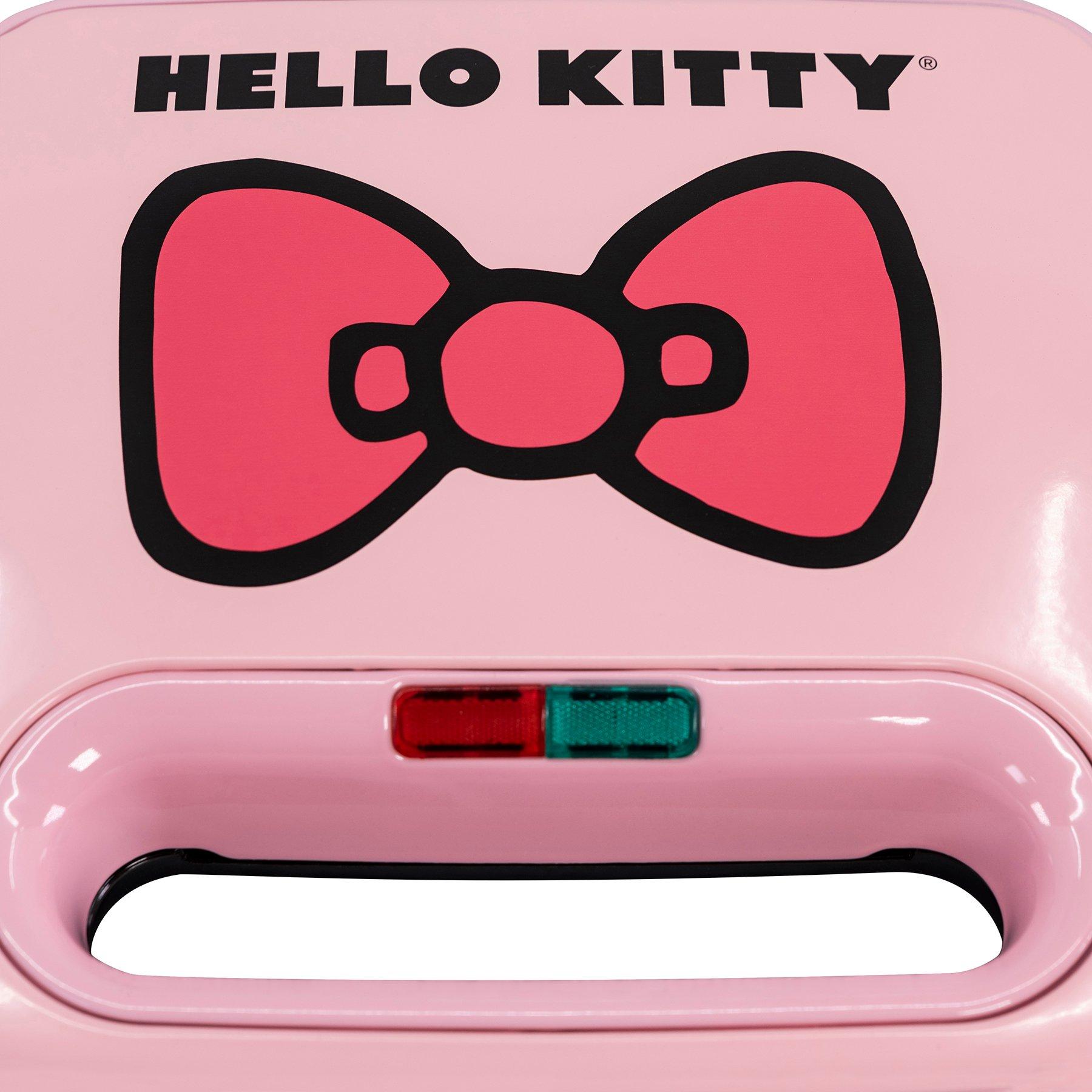 https://media.gamestop.com/i/gamestop/20005548_ALT06/Hello-Kitty-Grilled-Cheese-Maker?$pdp$