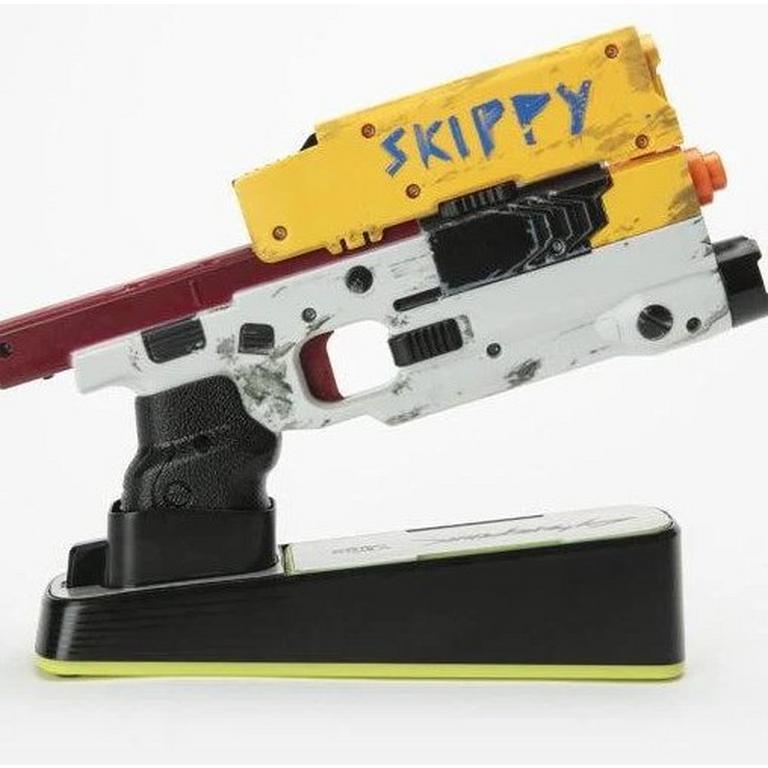 Cyberpunk 2077 Skippy Deluxe Blaster with Light Up Stand | GameStop