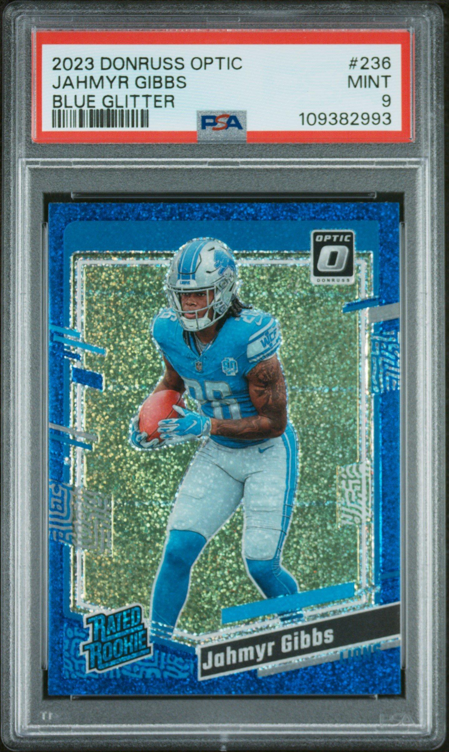 2023 Panini Donruss Optic 236 Jahmyr Gibbs Blue Glitter PSA 9